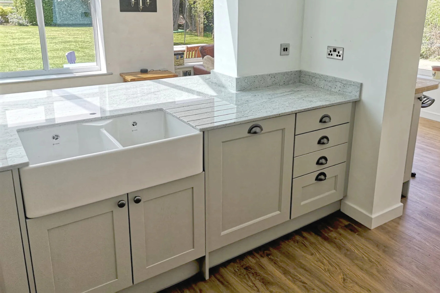 Granite kitchen worktops Herefordshire | Installation photo of a white granite worktop by MGD